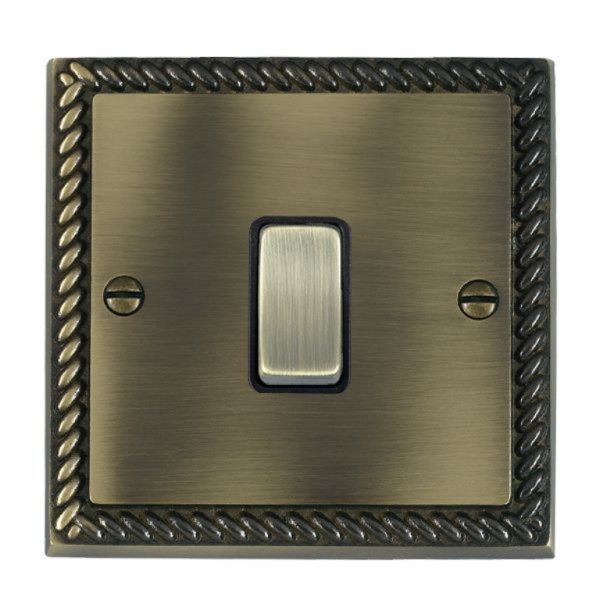 Hamilton 91DPAB-B Cheriton Georgian Antique Brass 20AX Double Pole Switch with Antique Brass Rocker and Black Surround