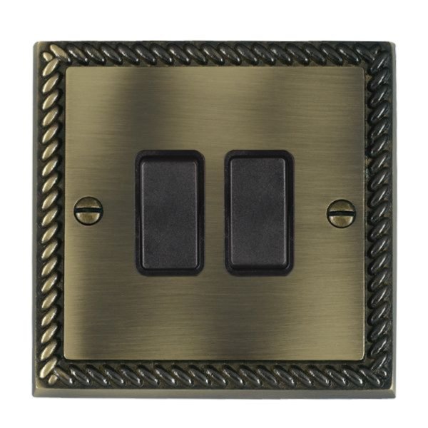 Hamilton 91R22BL-B Cheriton Georgian Antique Brass 2 Gang 10AX 2 Way Switch with Black Rockers and Black Surround