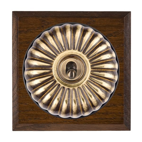 Hamilton Bloomsbury Chamfered Dark Oak 1 Gang 20AX Intermediate Toggle Switch with Antique Brass Fluted Dome and Black Collar