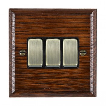 Hamilton Woods Ovolo Antique Mahogany 3 Gang 10AX 2 Way Switch with Antique Brass Rockers and Black Surround