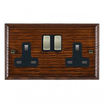 Hamilton Woods Ovolo Antique Mahogany 2 Gang 13A Double Pole Switched Socket with Antique Brass Rockers and Black Surround