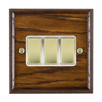 Hamilton Woods Ovolo Dark Oak 3 Gang 10AX 2 Way Switch with Polished Brass Rockers and White Surround