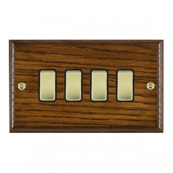 Hamilton Woods Ovolo Dark Oak 4 Gang 10AX 2 Way Switch with Polished Brass Rockers and Black Surround