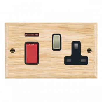 Hamilton Woods Ovolo Light Oak 45A Double Pole Switch with Red Rocker and Neon plus 13A Switched Socket with Antique Brass Rocker and Black Surround