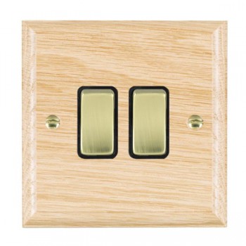 Hamilton Woods Ovolo Light Oak 2 Gang 10AX 2 Way Switch with Polished Brass Rockers and Black Surround