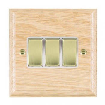 Hamilton Woods Ovolo Light Oak 3 Gang 10AX 2 Way Switch with Polished Brass Rockers and White Surround