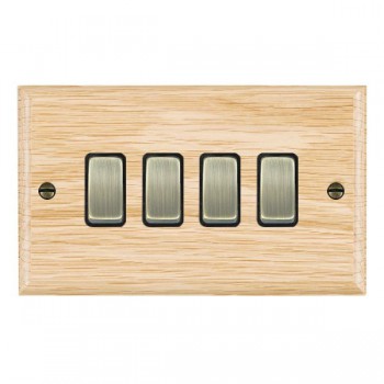 Hamilton Woods Ovolo Light Oak 4 Gang 10AX 2 Way Switch with Antique Brass Rockers and Black Surround