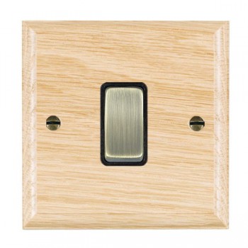 Hamilton Woods Ovolo Light Oak 1 Gang 10AX Intermediate Switch with Antique Brass Rocker and Black Surround