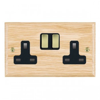 Hamilton Woods Ovolo Light Oak 2 Gang 13A Double Pole Switched Socket with Polished Brass Rockers and Black Surround