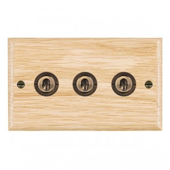 Hamilton Woods Ovolo Light Oak 3 Gang 20AX 2 Way Toggle Switch with Antique Brass Toggles