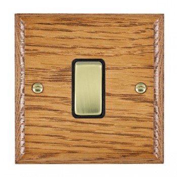 Hamilton Woods Ovolo Medium Oak 1 Gang 10AX 2 Way Switch with Polished Brass Rocker and Black Surround