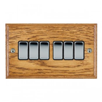 Hamilton Woods Ovolo Medium Oak 6 Gang 10AX 2 Way Switch with Bright Chrome Rockers and Black Surround