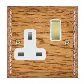 Hamilton Woods Ovolo Medium Oak 1 Gang 13A Double Pole Switched Socket with Polished Brass Rocker and White Surround